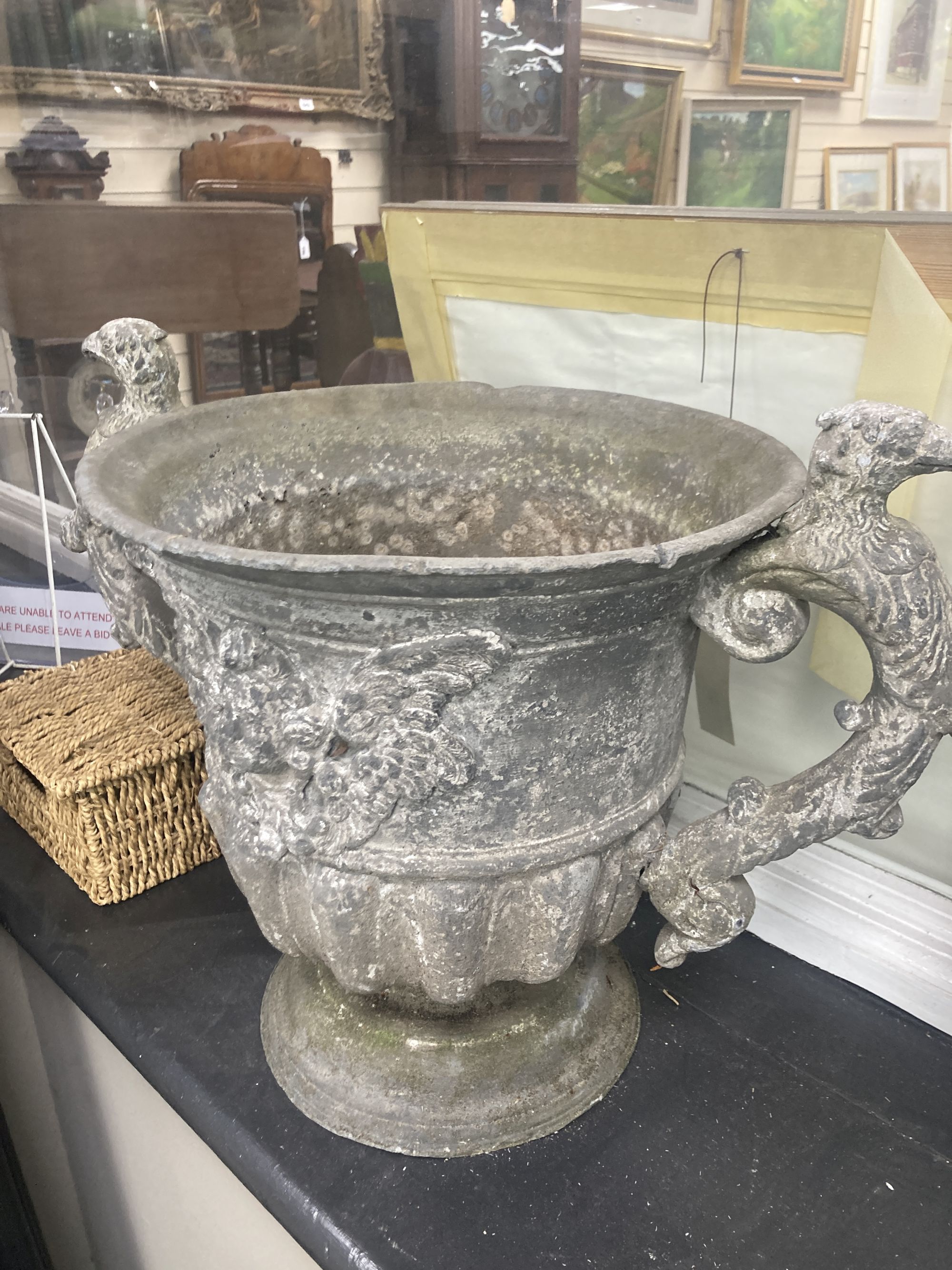 A pair of 19th century cast lead two handled garden planters, width 54cm, height 39cm